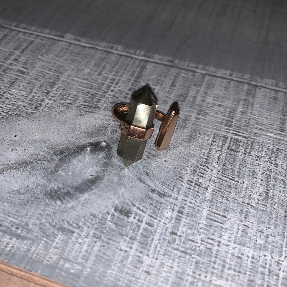 Adjustable Kendra Scott ring.